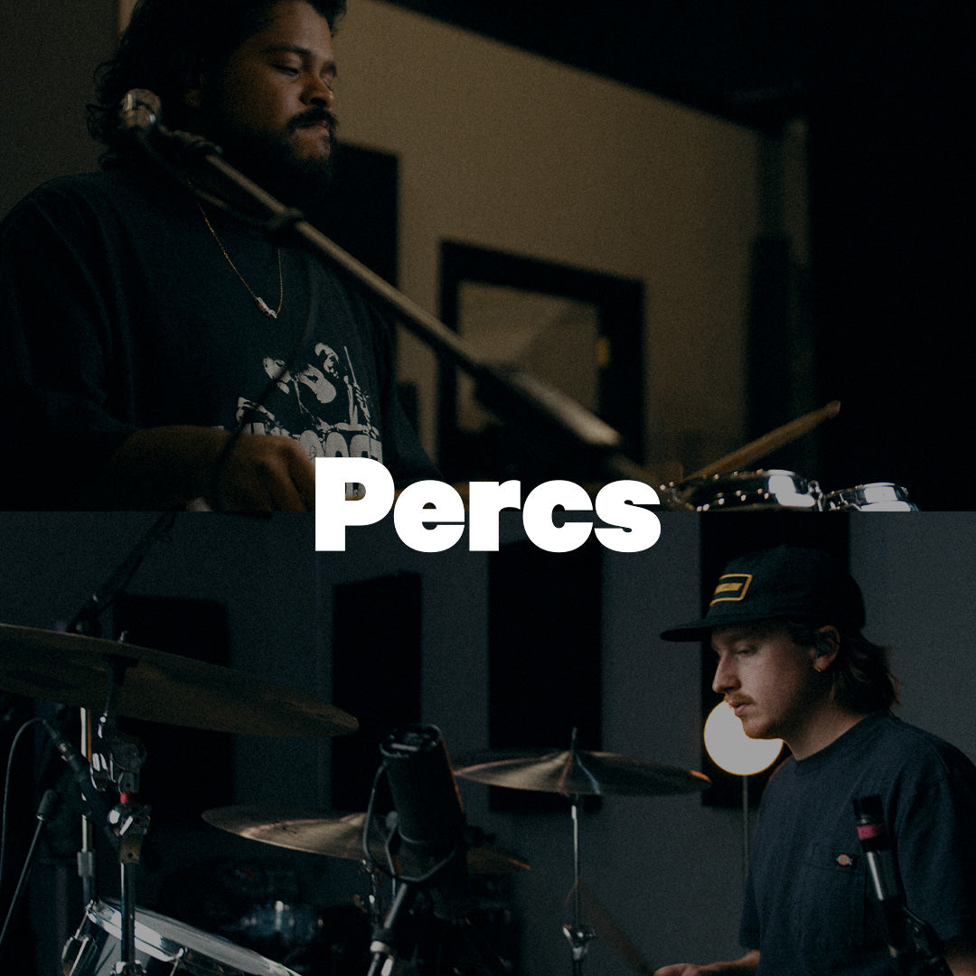 Ish Melton and Sebastian Suarez of PERCS behind the drums