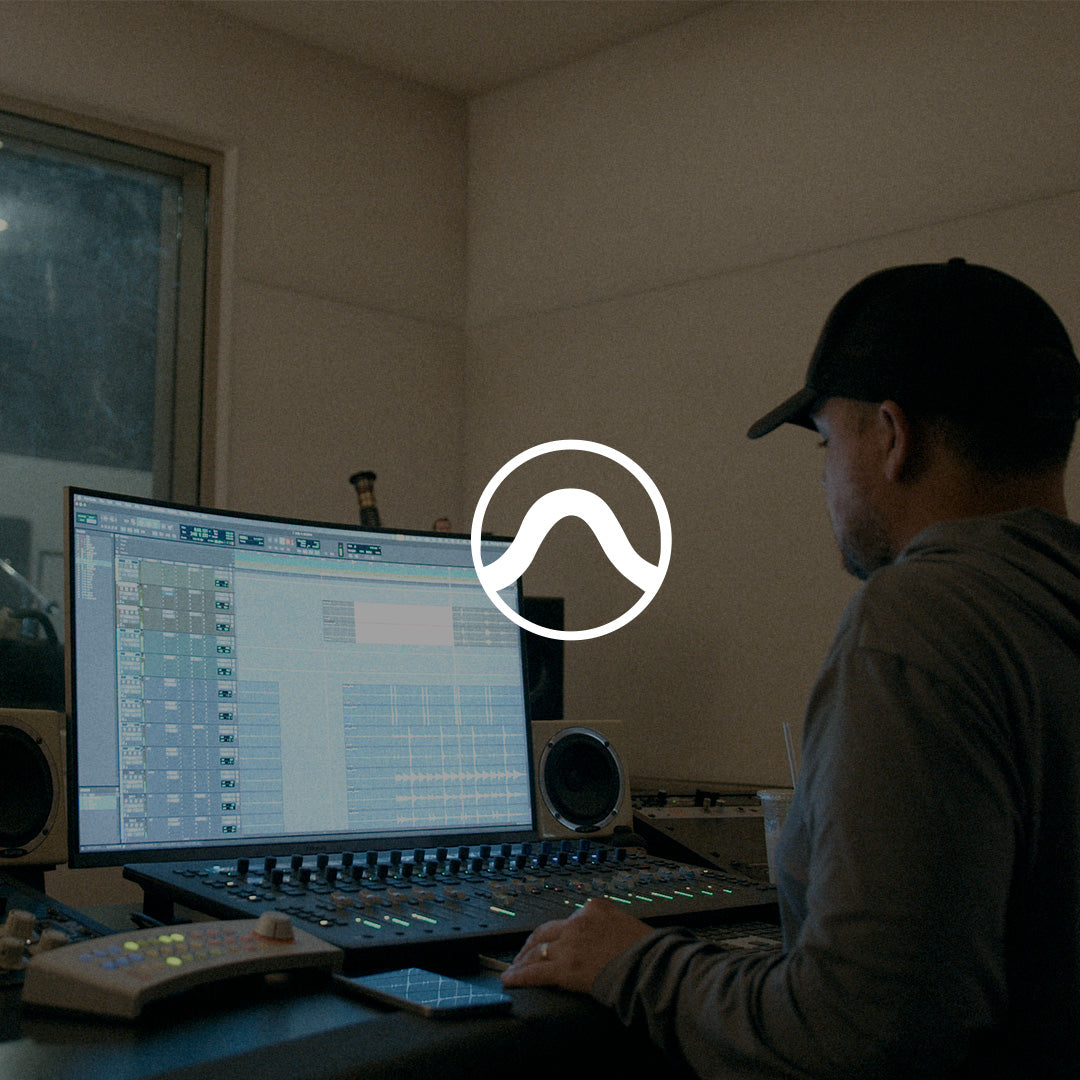Brandon Meyer mixing in Pro Tools at his studio console